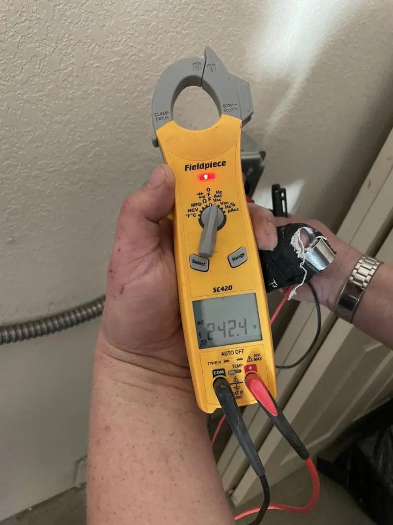 Voltage testing with clamp meter during Hot Tub / Pool Electrical Wiring in Kemp Mill